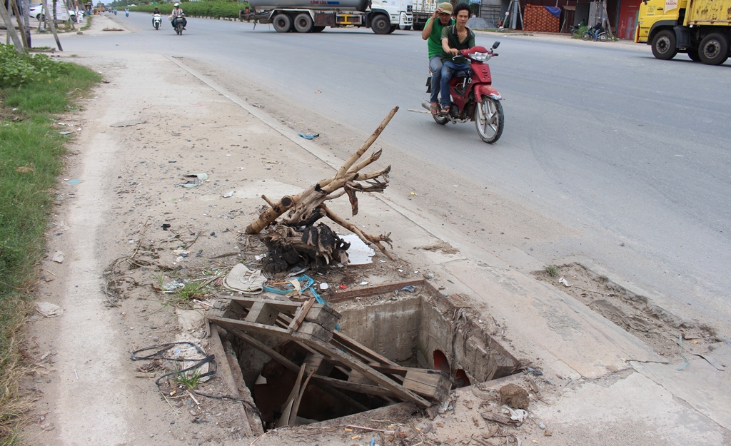 Những cạm bẫy chết người giữa phố ở Bình Dương - Ảnh 11. Những cạm bẫy chết người giữa phố ở Bình Dương - Ảnh 11.
