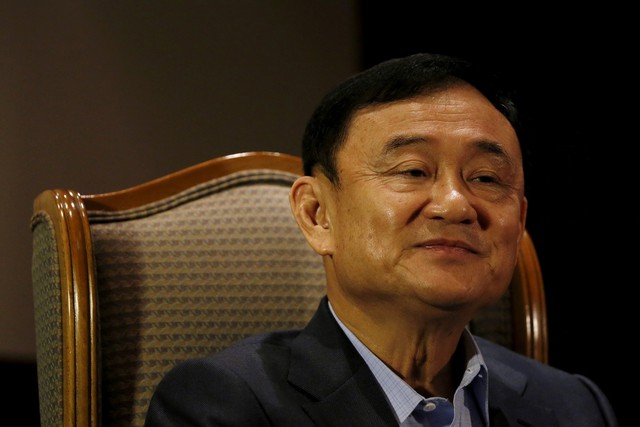 Thái Lan muốn xử vắng mặt cựu Thủ tướng Thaksin - Ảnh 1. Thái Lan muốn xử vắng mặt cựu Thủ tướng Thaksin - Ảnh 1.