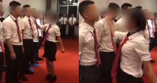 Nhân viên nam đứng dàn hàng ngang để sếp nữ tát - Ảnh 1. Nhân viên nam đứng dàn hàng ngang để sếp nữ tát - Ảnh 1.