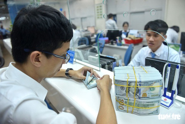 Giá USD ngân hàng chạm mốc 23 ngàn - Ảnh 1. Giá USD ngân hàng chạm mốc 23 ngàn - Ảnh 1.