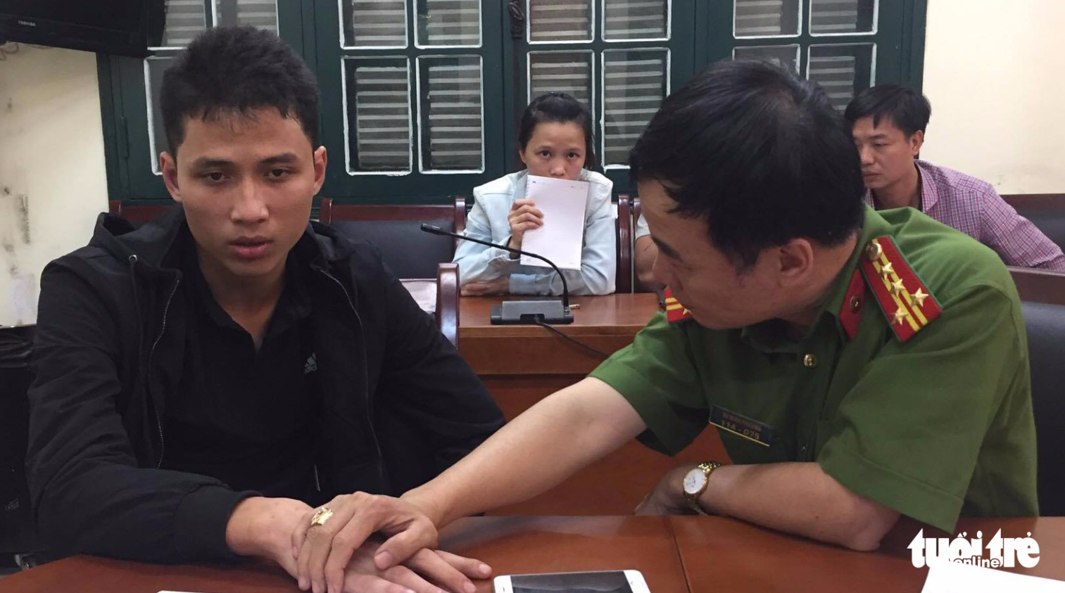 Nghi phạm Phạm Thanh Tùng tại cơ quan công an - Ảnh: GIANG LONG