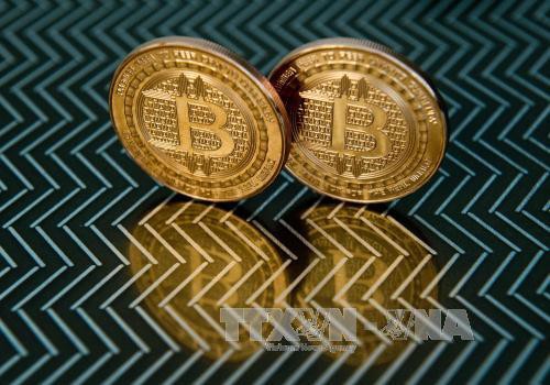 Giá trị đồng tiền ảo Bitcoin vượt mốc kỷ lục 10.000 USD - Ảnh 1.