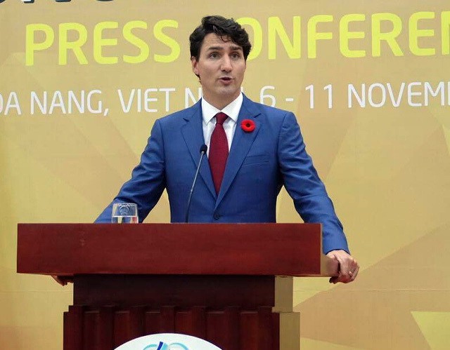 Thủ tướng Justin Trudeau giải thích chuyện bỏ họp TPP - Ảnh 1.