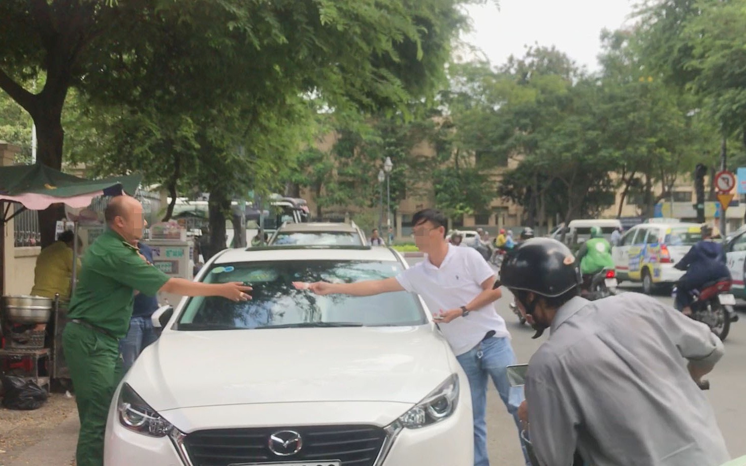3 tuyến đường ở TP.HCM sẽ thí điểm thu phí đỗ ô tô bằng công nghê mới - Ảnh 4.