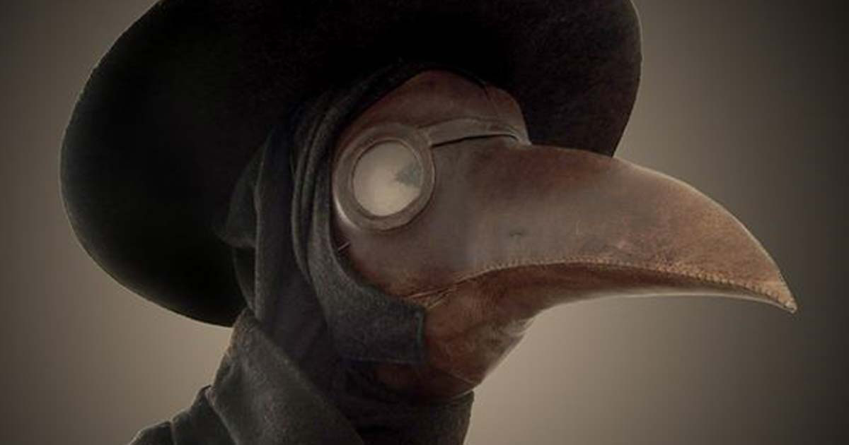 Tại sao bác sĩ tham gia chữa dịch hạch lại mặc đồ đen mang mặt nạ mỏ chim? - Ảnh 1.