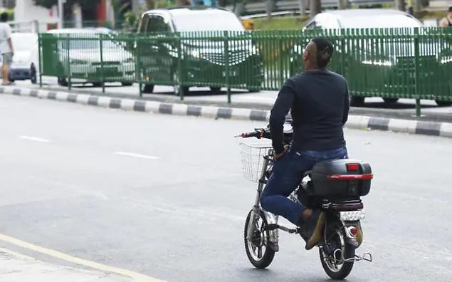 Singapore tính phạt tù người chạy xe đạp điện không thi lý thuyết