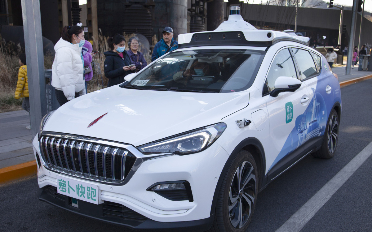 Đằng sau cơn sốt taxi tự hành trên mạng xã hội Trung Quốc- Ảnh 2. Nhiều thành phố ở Trung Quốc triển khai dịch vụ robotaxi