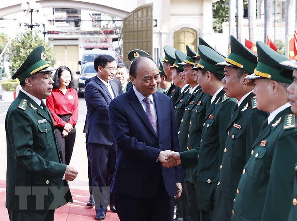 Chủ tịch nước Nguyễn Xuân Phúc kiểm tra công tác trực Tết của Bộ đội biên phòng Đắk Lắk - Ảnh 1.