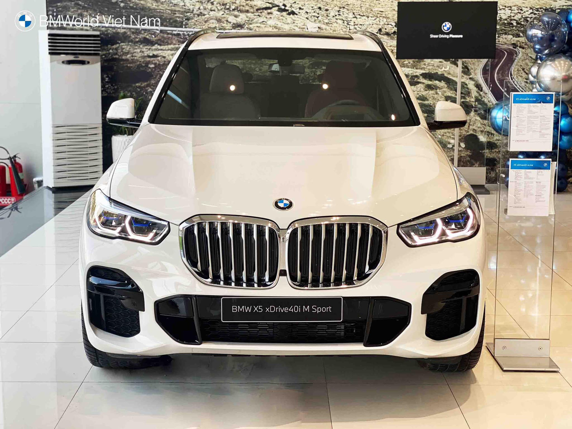 Xe BMW giảm giá hàng trăm triệu đồng ở Việt Nam, tăng ưu thế trước Mercedes-Benz - Ảnh 1.