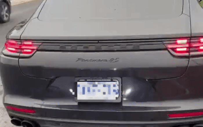 Dùng biển số lật để tránh nộp phạt, lại bị phạt gần 300 lỗi- Ảnh 2. Porsche che biển số bằng