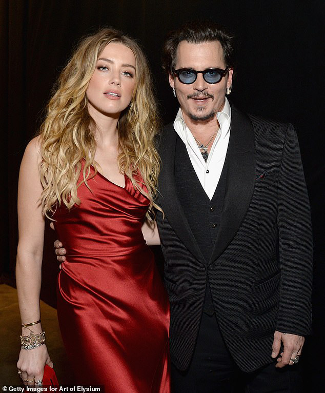 Amber Heard vừa trả 1 triệu USD, Johnny Depp lên ngay kế hoạch chi tiêu - Ảnh 1. Amber Heard vừa trả 1 triệu USD, Johnny Depp lên ngay kế hoạch chi tiêu - Ảnh 1.