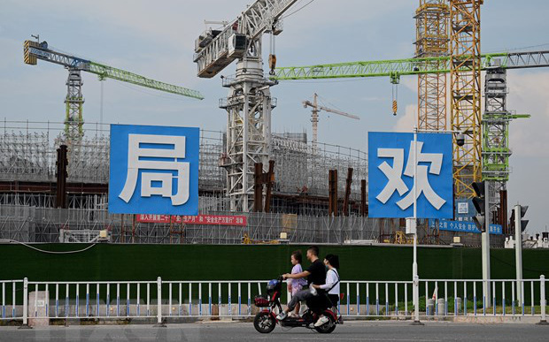 Các công ty bất động sản Trung Quốc đối mặt nguy cơ mất khả năng thanh toán