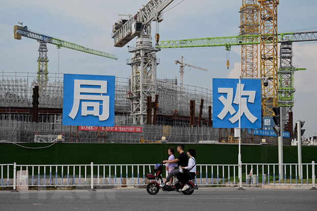 Một công trình xây dựng của Tập đoàn bất động sản Evergrande ở Quảng Châu, tỉnh Quảng Đông, Trung Quốc, ngày 17-9-2021 - Ảnh: AFP