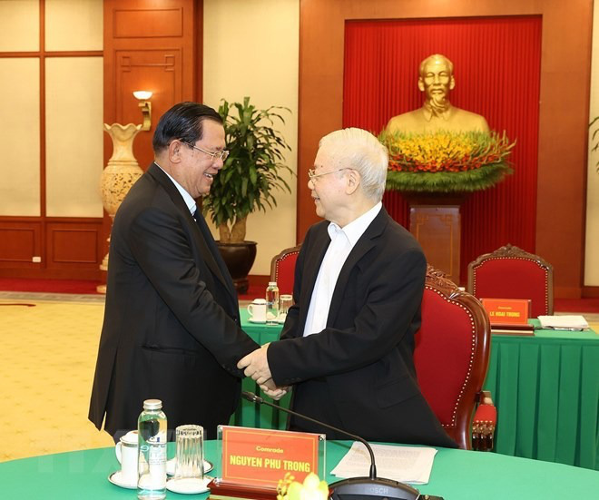 Tổng bí thư Nguyễn Phú Trọng đón Chủ tịch Đảng Nhân dân Campuchia Hun Sen - Ảnh: TTXVN