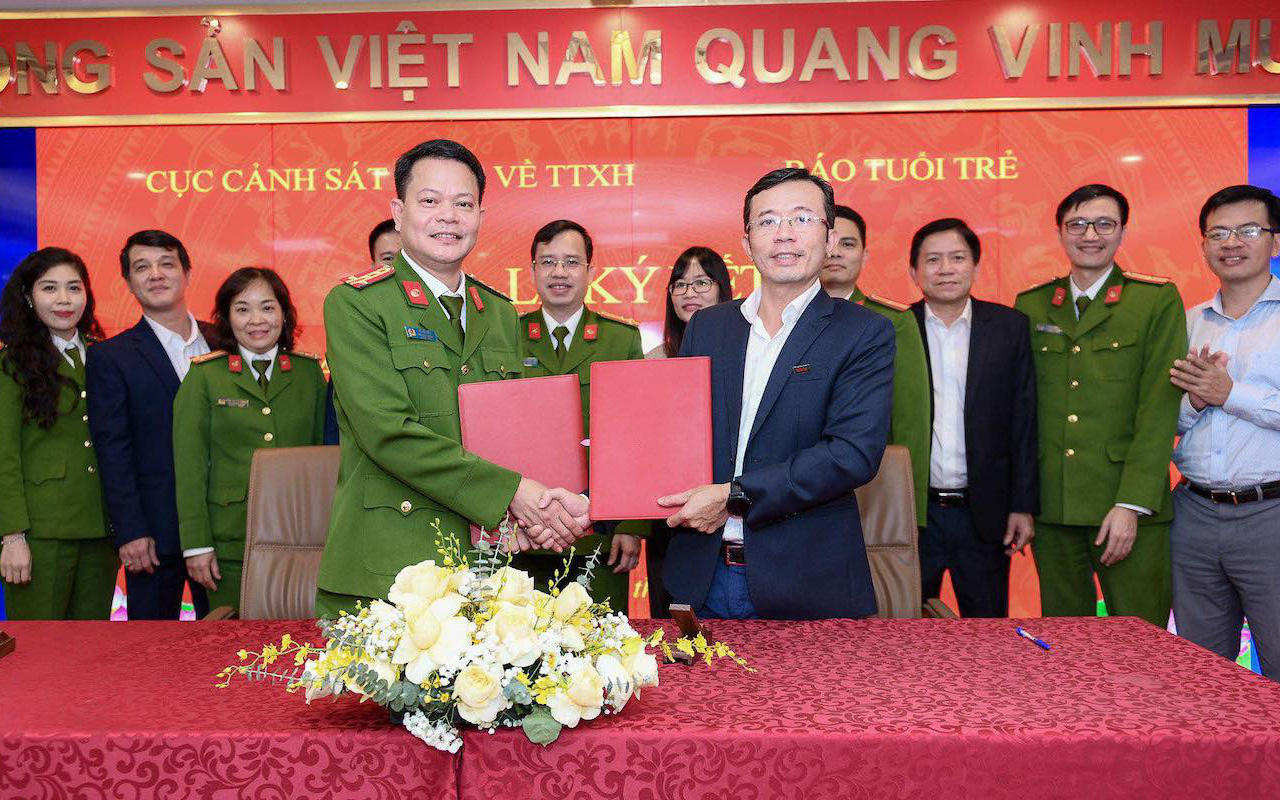Cấp lý lịch tư pháp trực tuyến trên ứng dụng VNeID từ 30-3- Ảnh 3. Cục C06 Bộ Công an và báo Tuổi Trẻ ký hợp tác truyền thông đề án 06