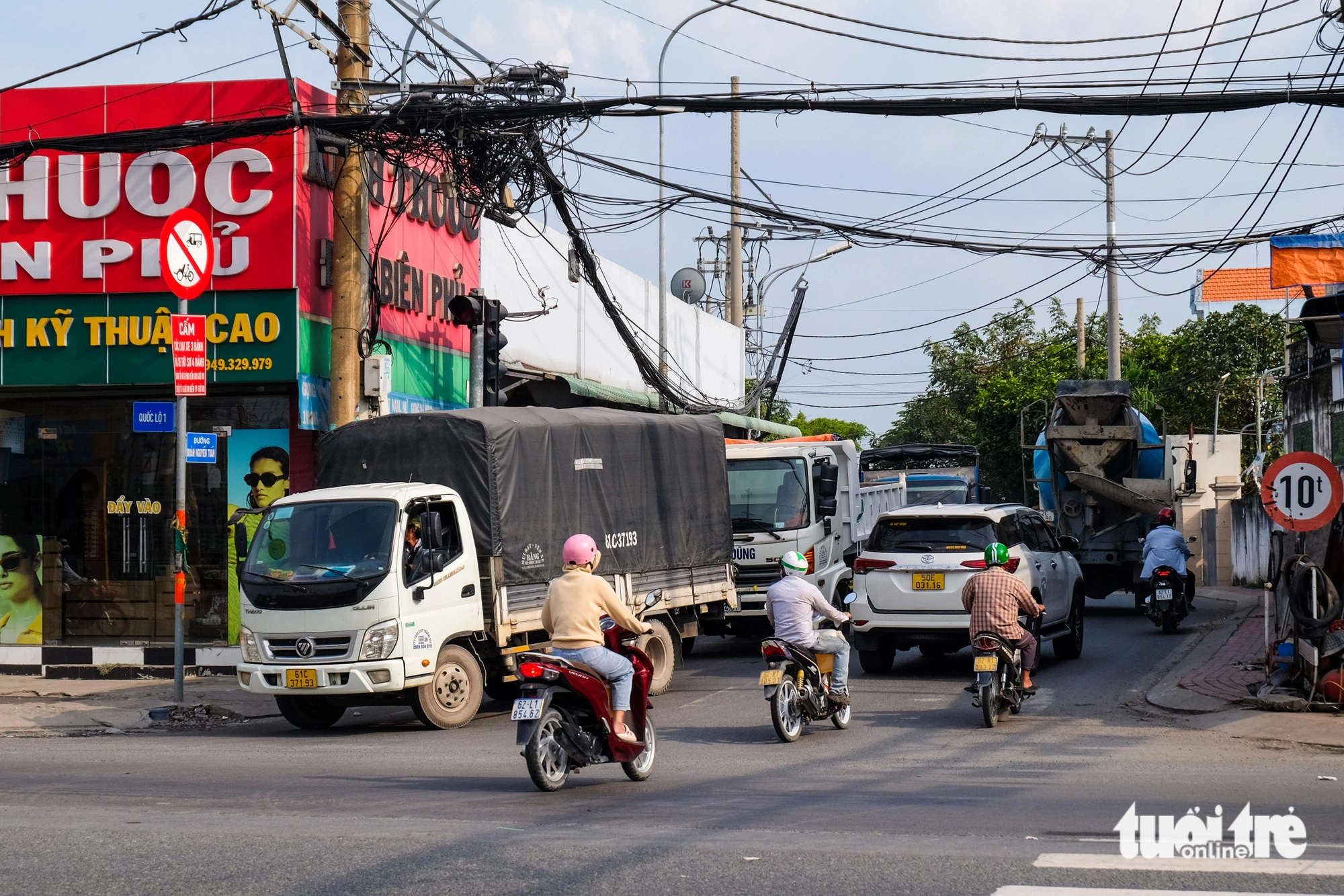 Toàn cảnh phương án mở rộng quốc lộ 1 ở cửa ngõ Tây TP.HCM lên 10-12 làn xe - Ảnh 12.