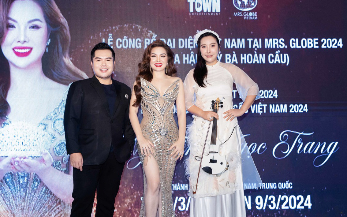 Á hậu Ngọc Hằng khám phá vẻ đẹp vịnh biển Quy Nhơn với mô tô nước- Ảnh 6. Nghệ sĩ violin Hàn Quốc Jmi Ko diện áo dài đến chúc mừng hoa hậu Ngọc Trang