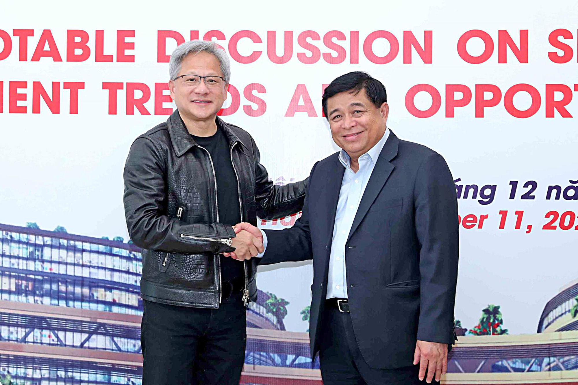 Bộ trưởng Nguyễn Chí Dũng và ông Jensen Huang - chủ tịch Tập đoàn NVIDIA - Ảnh: MPI
