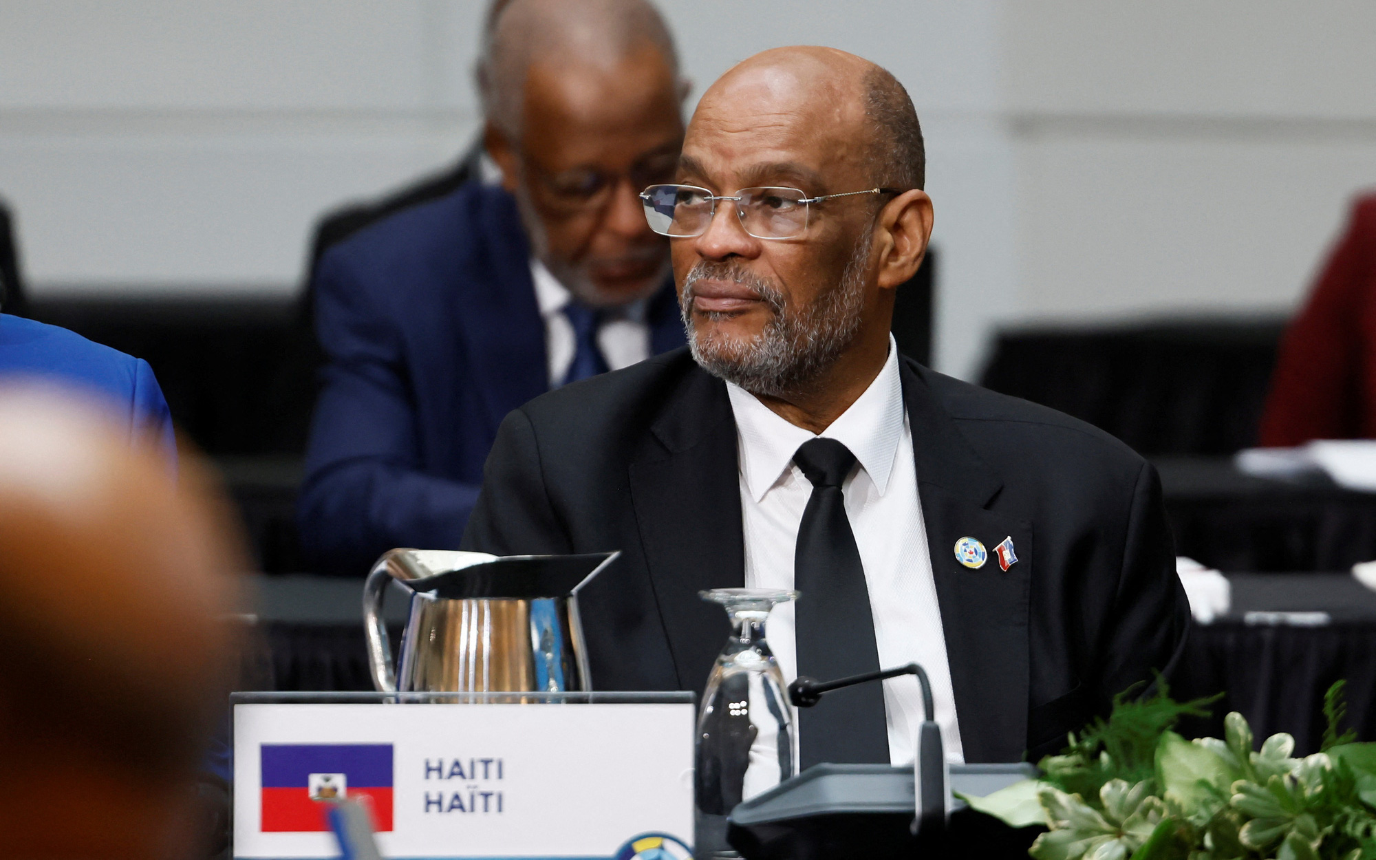 Haiti tràn ngập các băng nhóm vũ trang, ngân hàng trung ương bị tấn công- Ảnh 2. Thủ tướng Haiti từ chức giữa lúc bạo lực băng đảng lan rộng