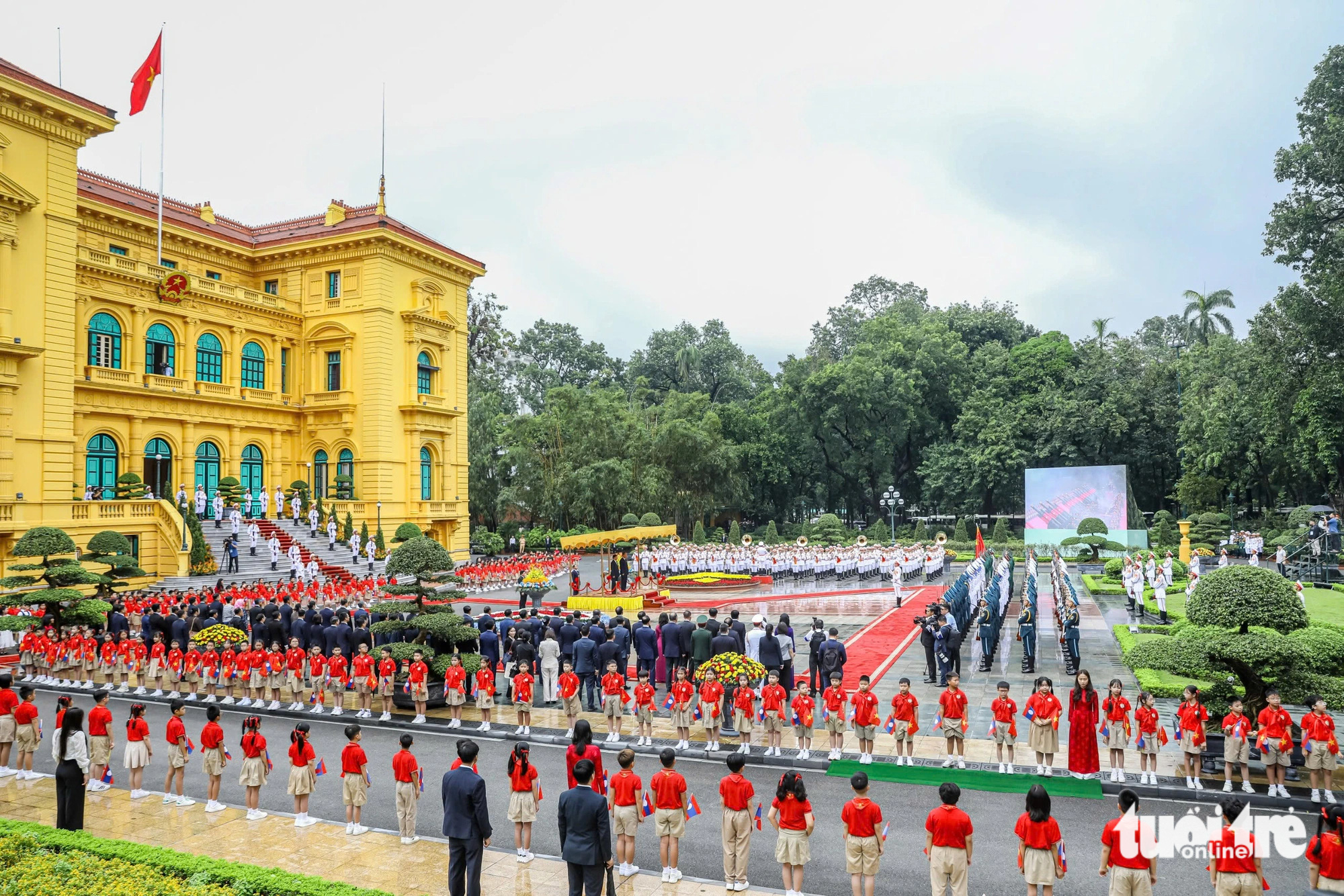 21 phát đại bác trong lễ đón trọng thể Tổng Bí thư, Chủ tịch nước Lào - Ảnh 4.