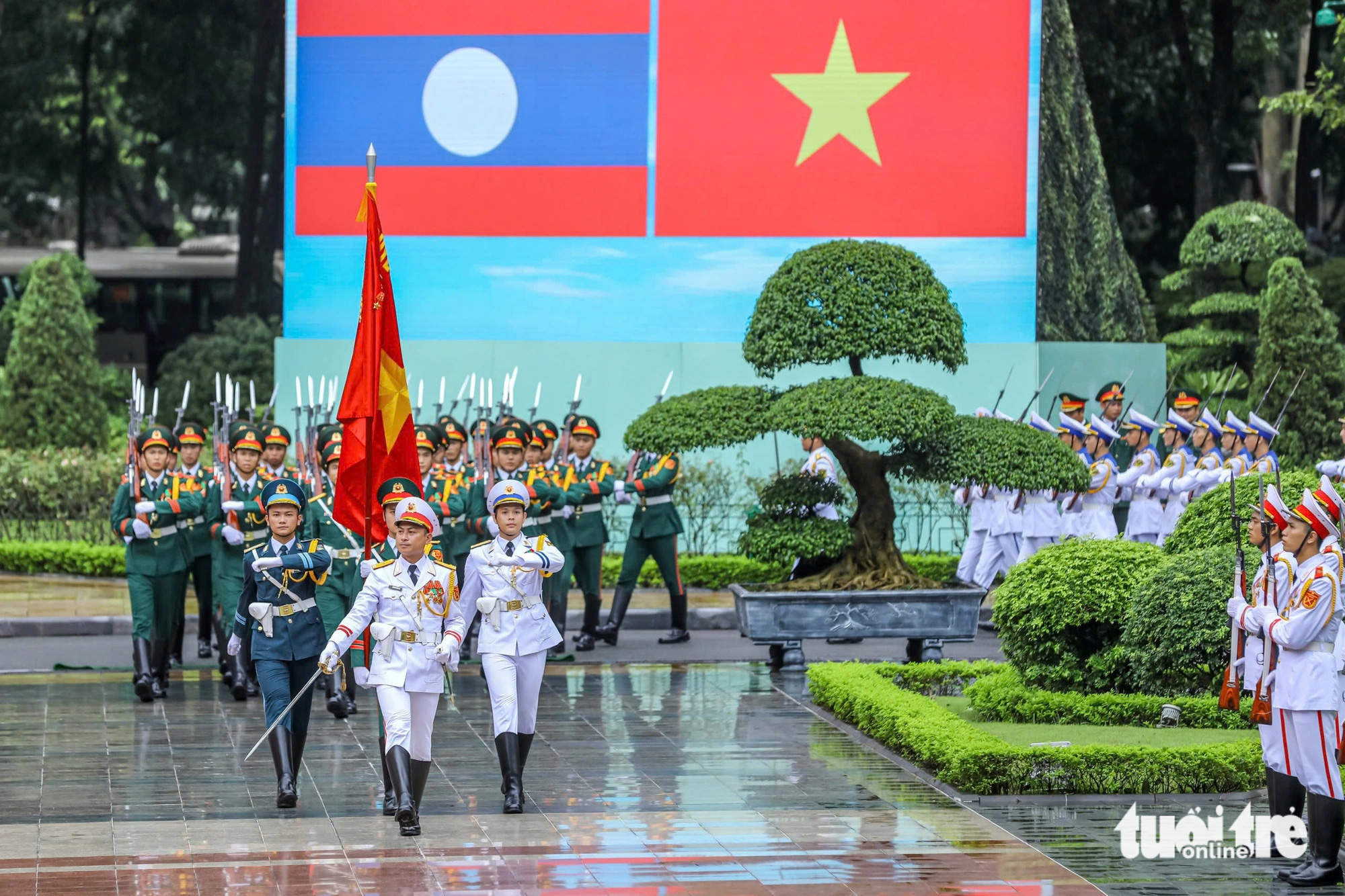 21 phát đại bác trong lễ đón trọng thể Tổng Bí thư, Chủ tịch nước Lào - Ảnh 7.