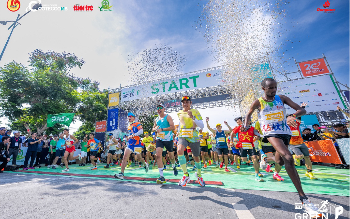 Khai mạc giải Marathon đất sen hồng dưới trời mưa - Ảnh 4.