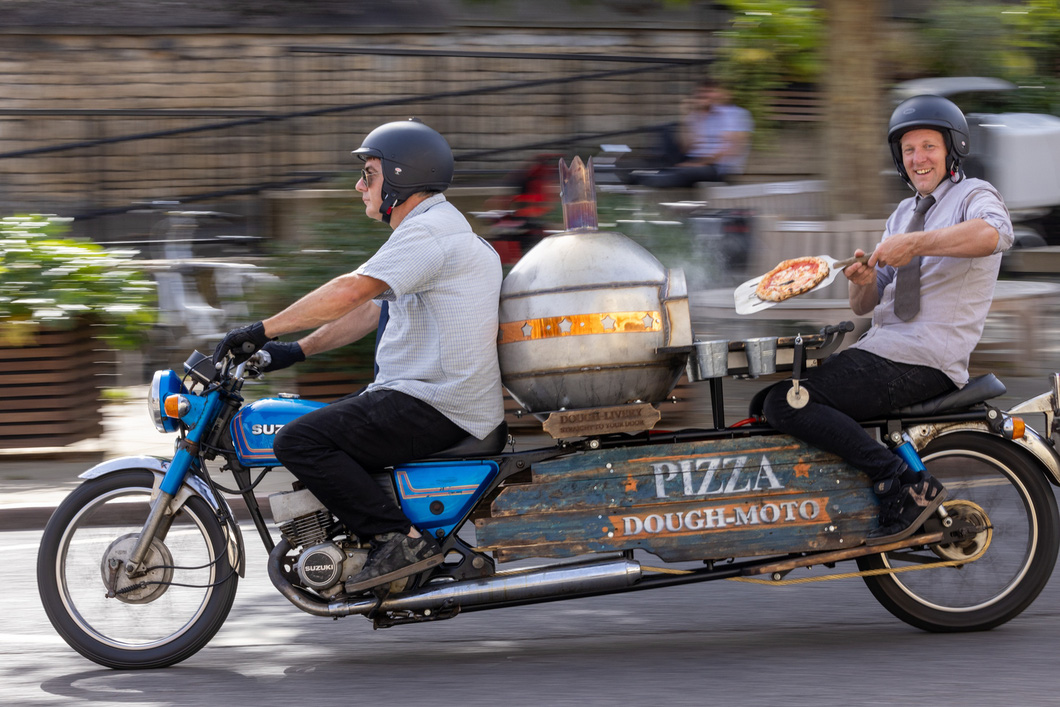 YouTuber Colin Furze said he doesn't really like eating pizza at the store, neither warm nor hot.  Wanting to change it up, he decided to convert his motorcycle into a mobile pizza oven, and in the introduction video, he's confident that it 
