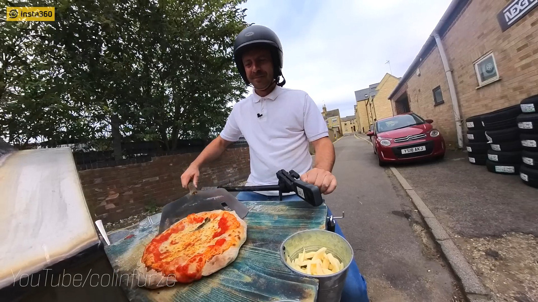 Eventually, he gave up making pizza and went to a professional.  This is probably the best idea because they finally have real pizza to serve to customers - Photo: Colin Furze/Youtube