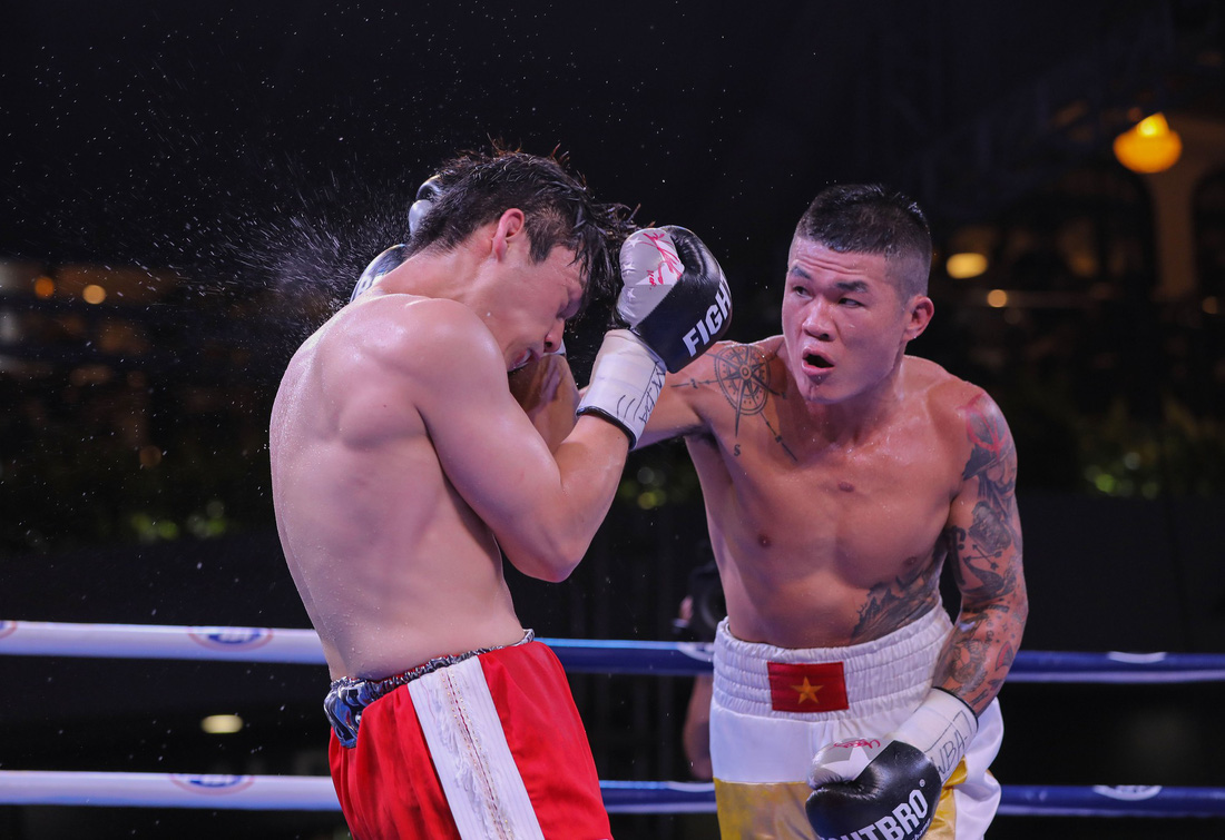 Đánh bại võ sĩ Hàn Quốc, Trương Đình Hoàng giành đai WBA Đông Á - Ảnh 7.