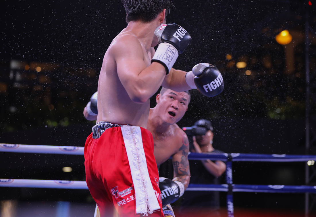 Đánh bại võ sĩ Hàn Quốc, Trương Đình Hoàng giành đai WBA Đông Á - Ảnh 6.