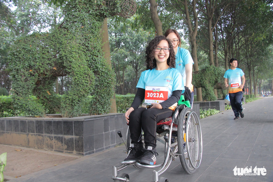 Ghép đôi chạy bộ với người khuyết tật để cùng về đích - Ảnh 7.