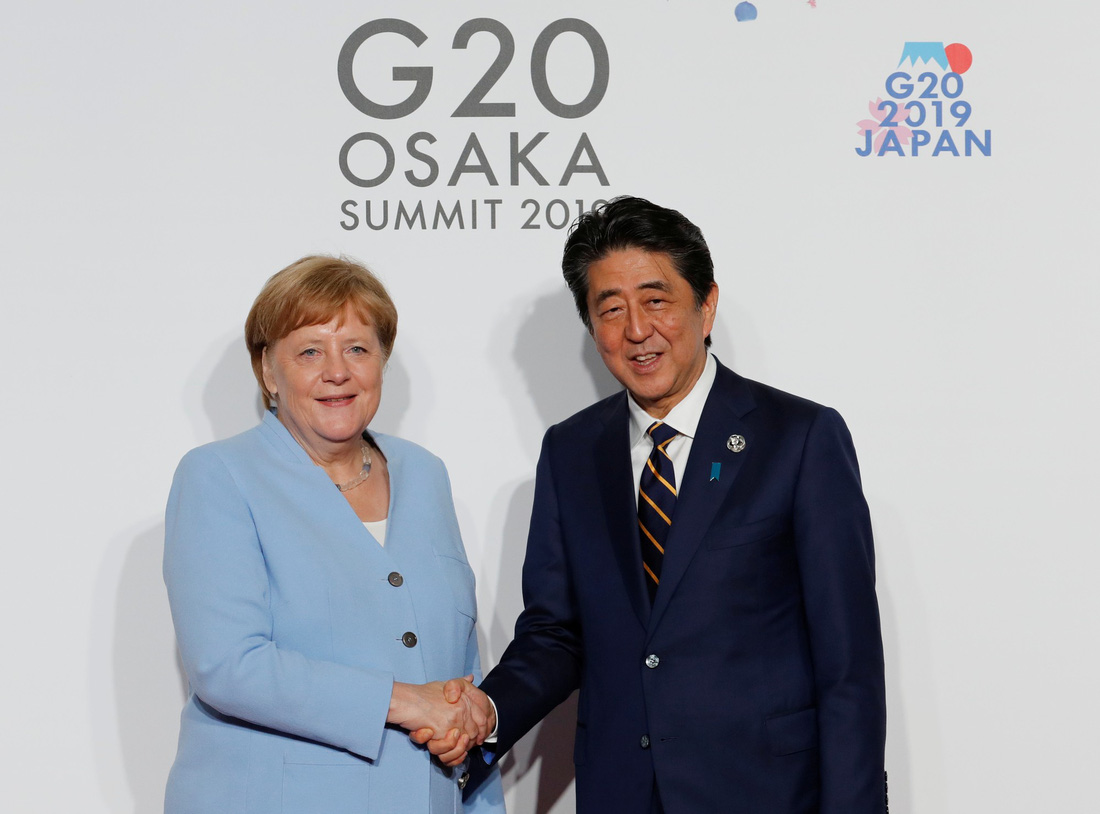 Tiết lộ hậu trường chụp ảnh gia đình G20 ở Osaka - Ảnh 10.