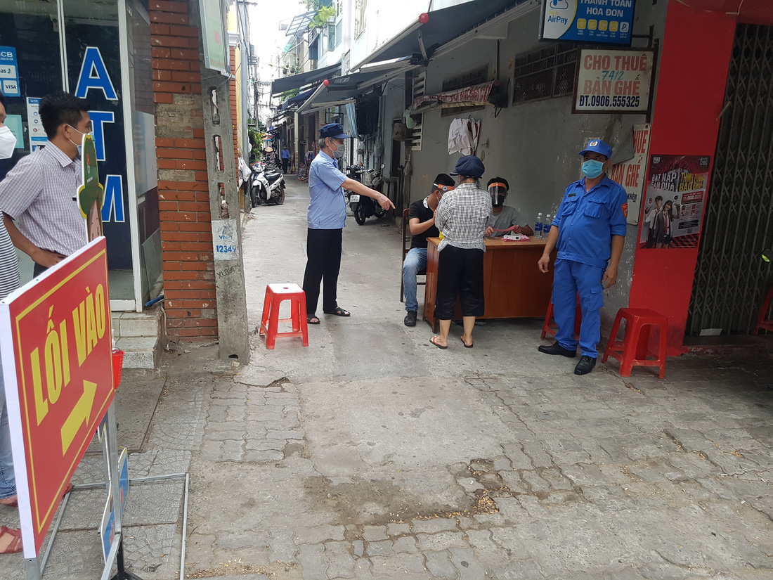 Đi chợ tem phiếu sáng nay ở Đà Nẵng - Ảnh 5.