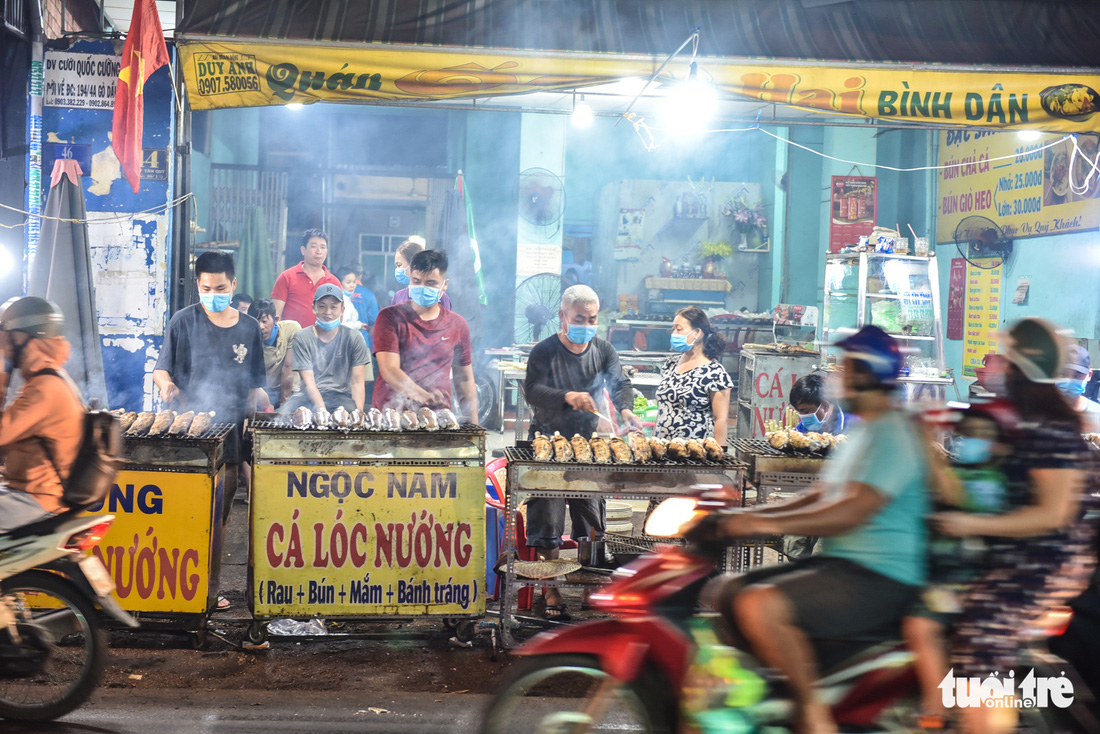 Nửa đêm người dân đi mua cá lóc để vía Thần Tài - Ảnh 5.