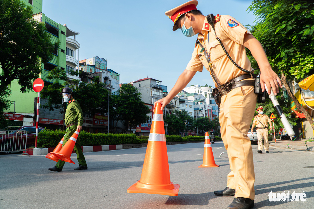 39 chốt phân vùng phòng dịch sau 6-9 tại Hà Nội được kích hoạt - Ảnh 2.