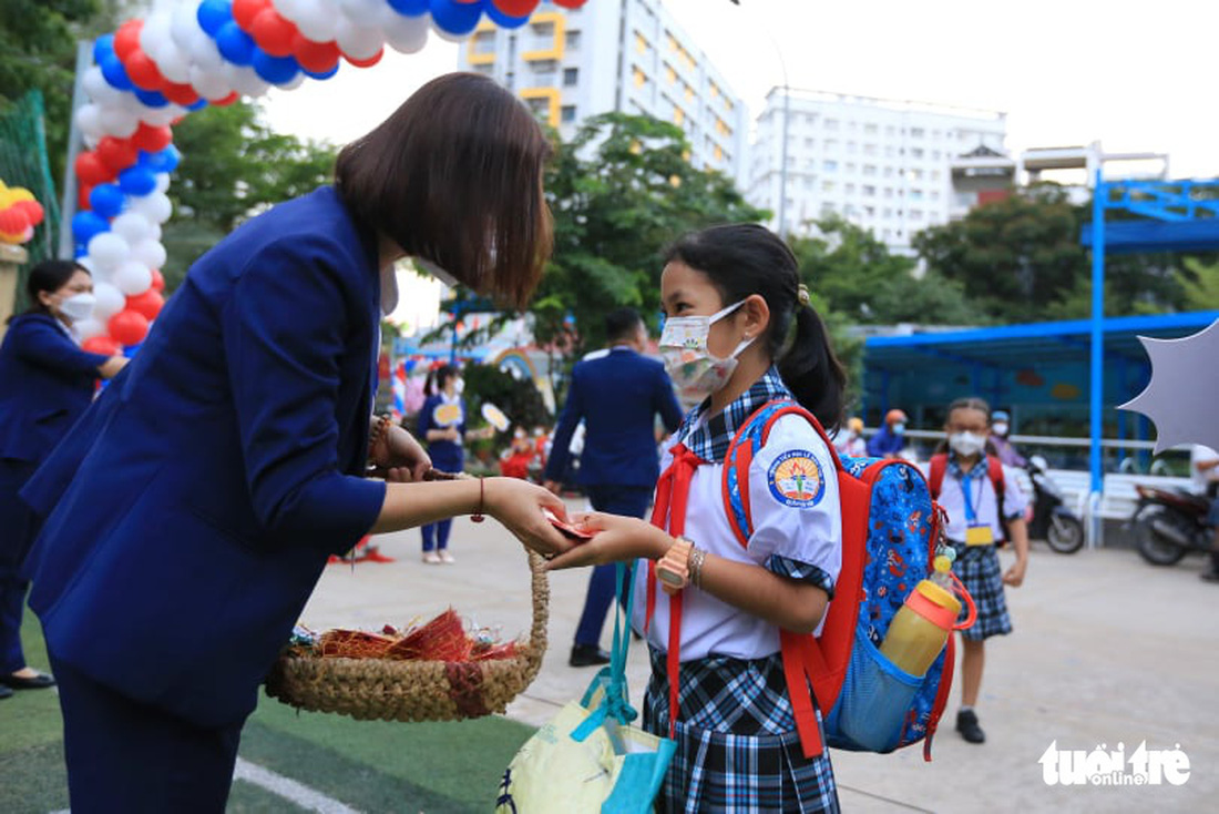 Sáng nay 14-2, hơn 1 triệu học sinh mầm non, tiểu học TP.HCM trở lại trường - Ảnh 10.