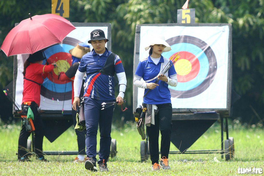 Xạ thủ, cung thủ đổ mồ hôi trên sân tập trước SEA Games 31 - Ảnh 9.