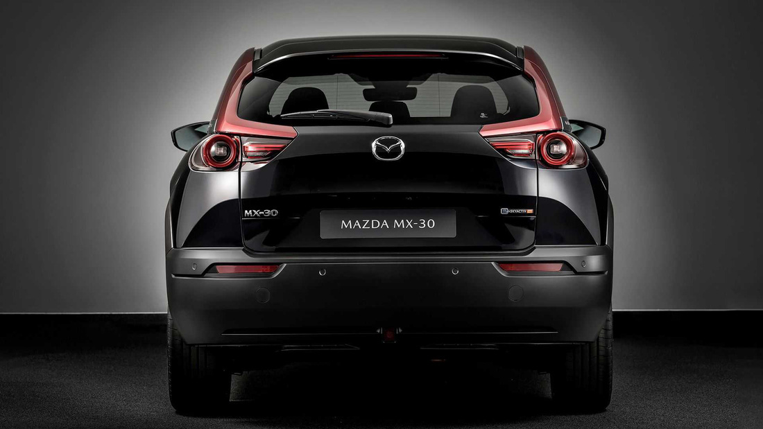 Mazda MX-30 - SUV nhỏ tận dụng động cơ xoay, chạy hơn 600km mới phải sạc - Ảnh 4.