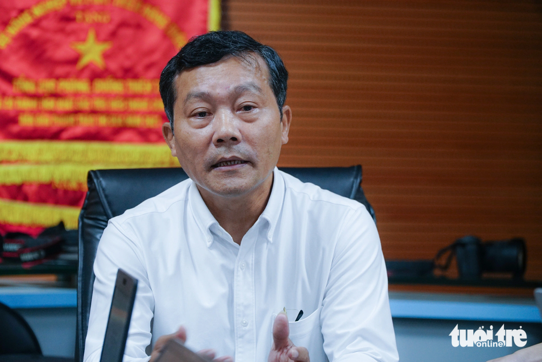 Ông Nguyễn Văn Tiến - phó chánh văn phòng Ban Chỉ đạo quốc gia về phòng chống thiên tai - chia sẻ liên quan đến ngập lụt tại Đà Nẵng - Ảnh: NGUYỄN HIỀN
