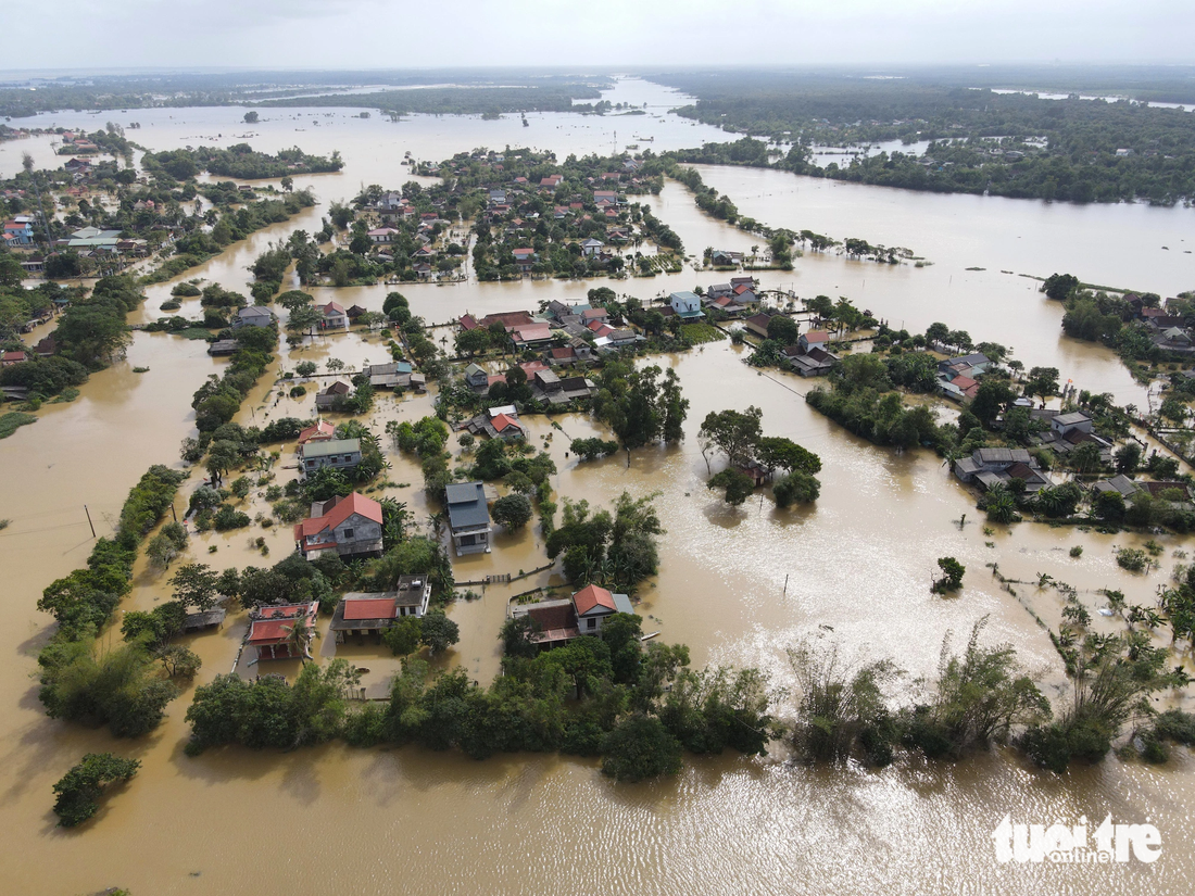 Toàn xã Phong Bình có 850 hộ dân bị ngập từ 0,3-0,9cm - Ảnh: HOÀNG TÁO