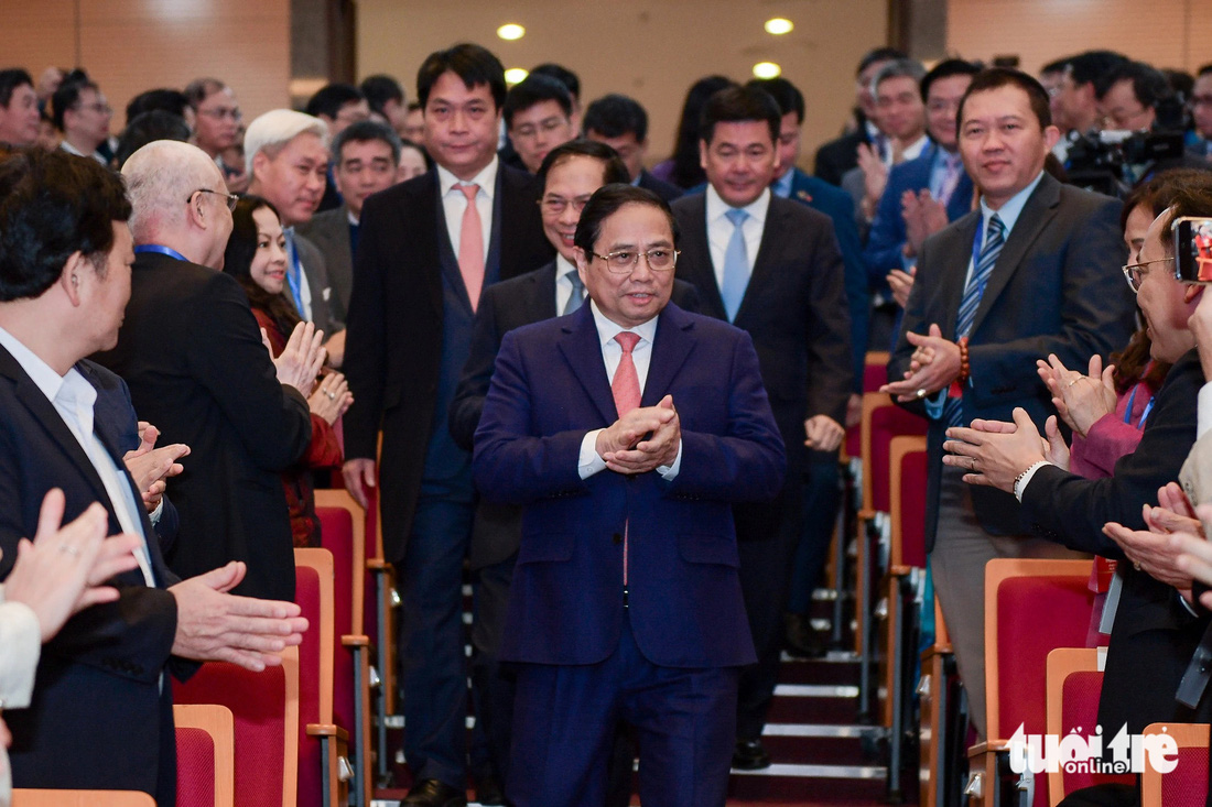 Thủ tướng Phạm Minh Chính đến dự phiên họp ngoại giao kinh tế ngày 21-12 - Ảnh: NAM TRẦN
