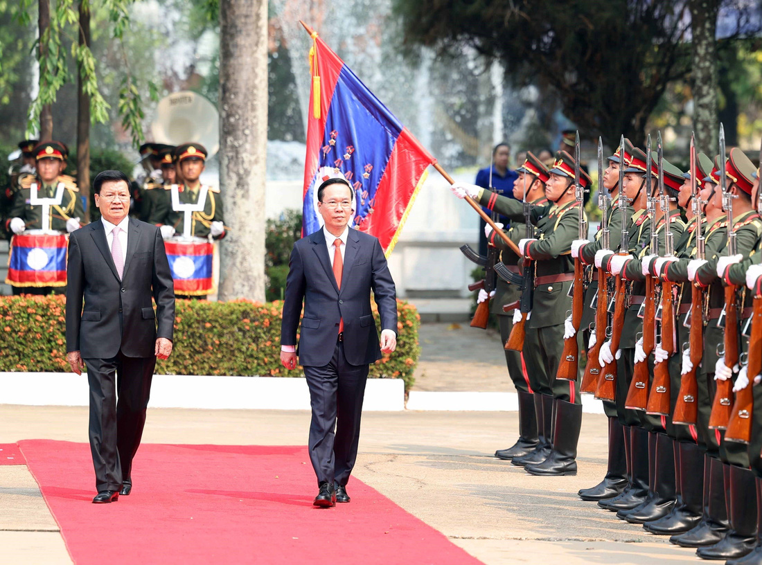 Lễ đón trọng thể Chủ tịch nước Võ Văn Thưởng tại Lào - Ảnh 6.