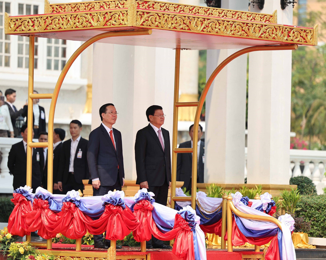 Lễ đón trọng thể Chủ tịch nước Võ Văn Thưởng tại Lào - Ảnh 5.
