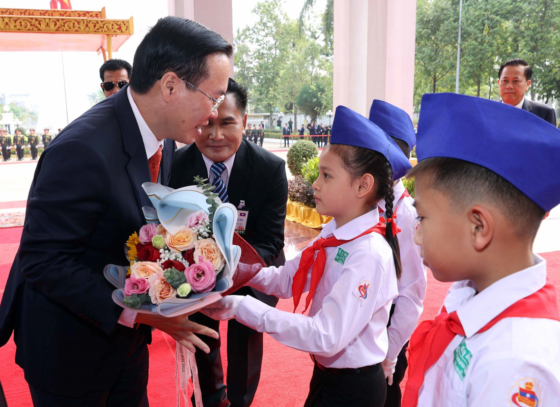 Lễ đón trọng thể Chủ tịch nước Võ Văn Thưởng tại Lào - Ảnh 4.