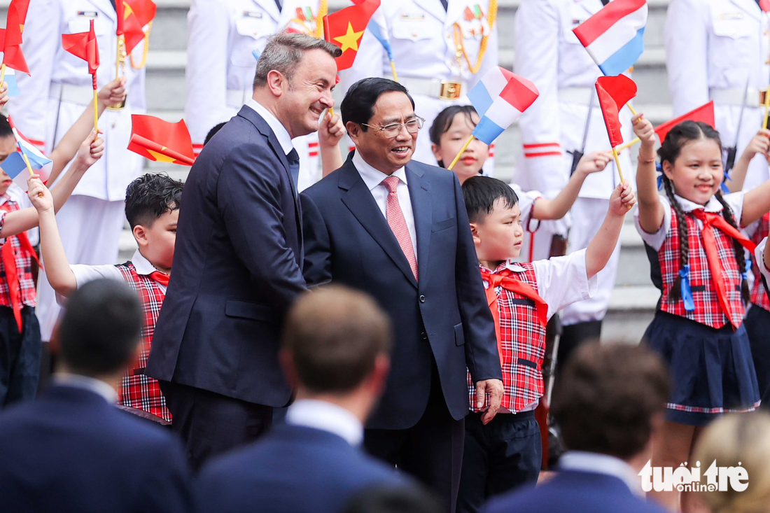 Thủ tướng Phạm Minh Chính chủ trì lễ đón Thủ tướng Luxembourg - Ảnh 1.