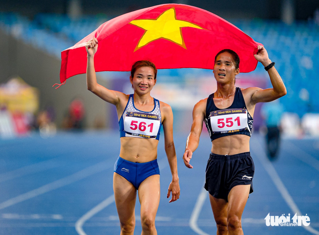 Chùm ảnh Nguyễn Thị Oanh lập kỳ tích SEA Games khi giành 2 HCV trong 30 phút - Ảnh 12.