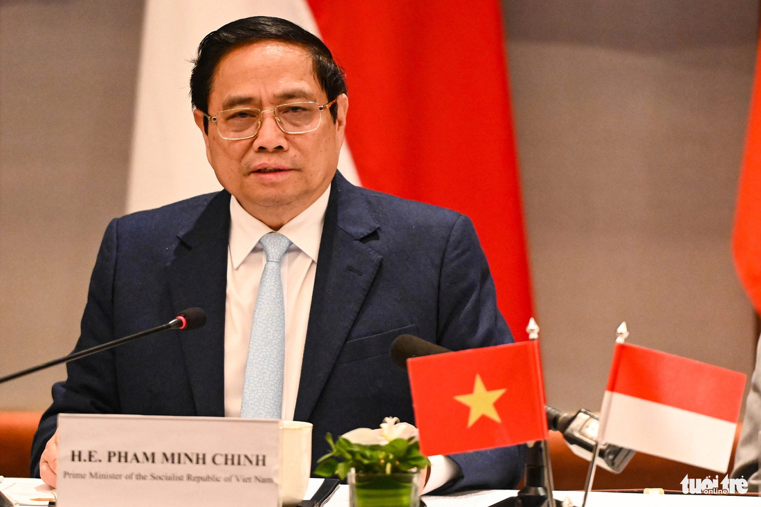 Thủ tướng Phạm Minh Chính khẳng định Việt Nam luôn lắng nghe, đối thoại với doanh nghiệp để xem xét tích cực, xử lý thỏa đáng các đề xuất của doanh nghiệp - Ảnh: HỒNG QUANG