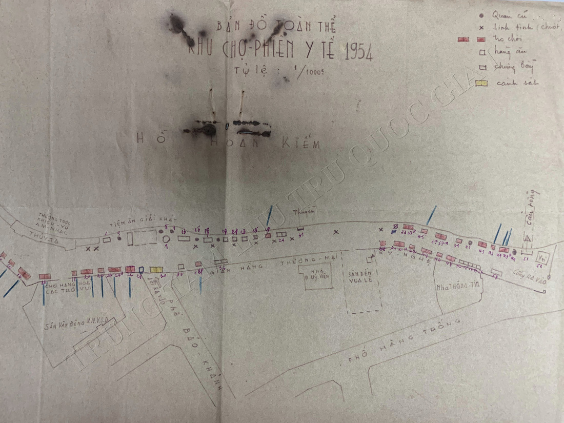 Bản đồ toàn thể khu chợ phiên y tế năm 1954 thể hiện rõ vị trí cầu Rồng nối từ bờ hồ ra Tháp Rùa
