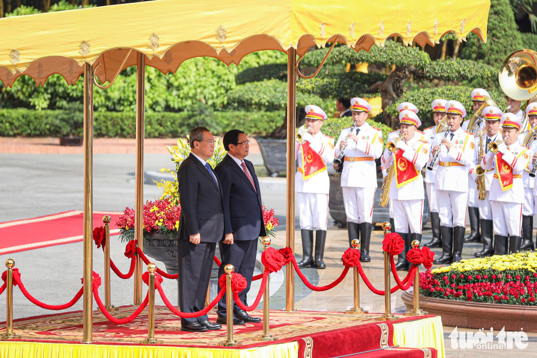 Thủ tướng Phạm Minh Chính chủ trì lễ đón trọng thị Thủ tướng Trung Quốc Lý Cường - Ảnh 7.