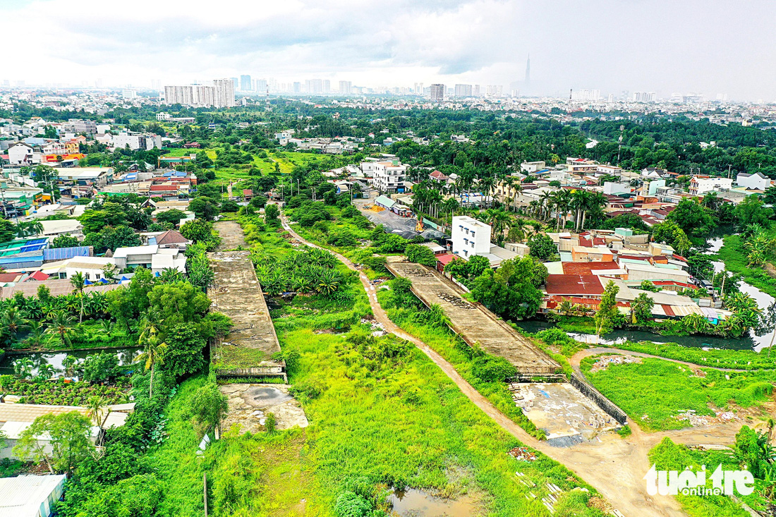 Hạ tầng đi sau, nền kinh tế lãnh đủ - Ảnh 2.